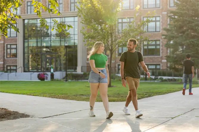 student walking by smhs