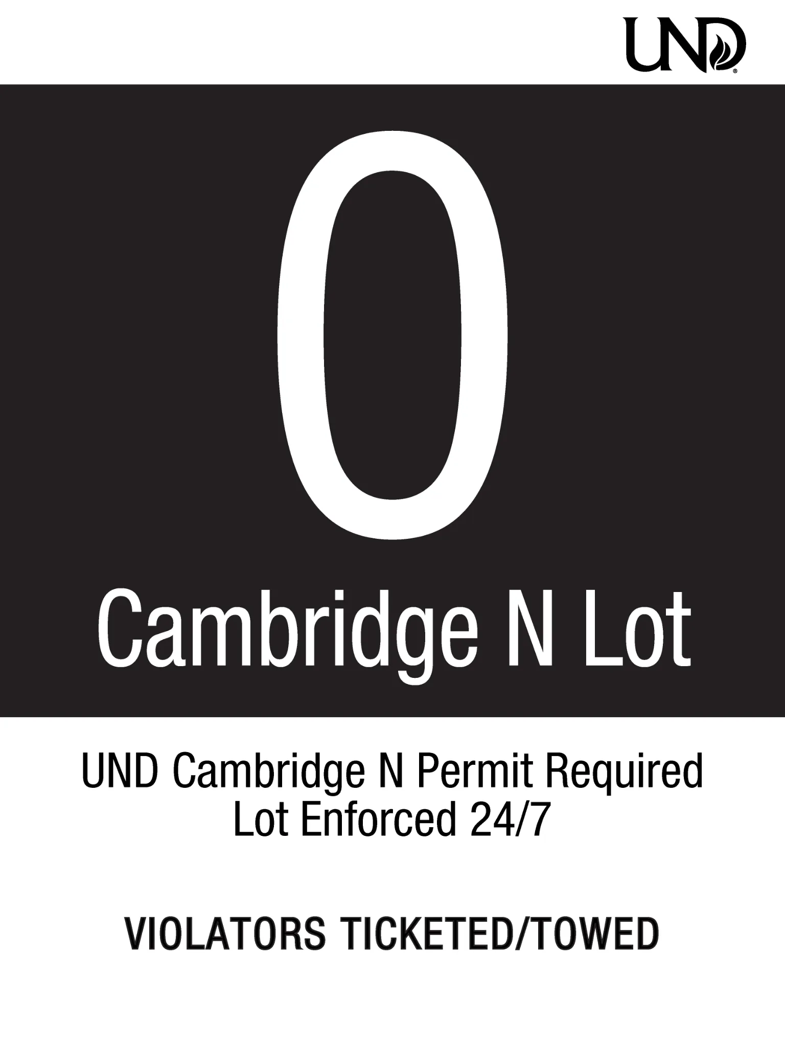 UND parking sign with solid black background labeled O for Cambridge N Lot. Cambridge N permit required. Lot enforced 24/7. Violators ticketed or towed.