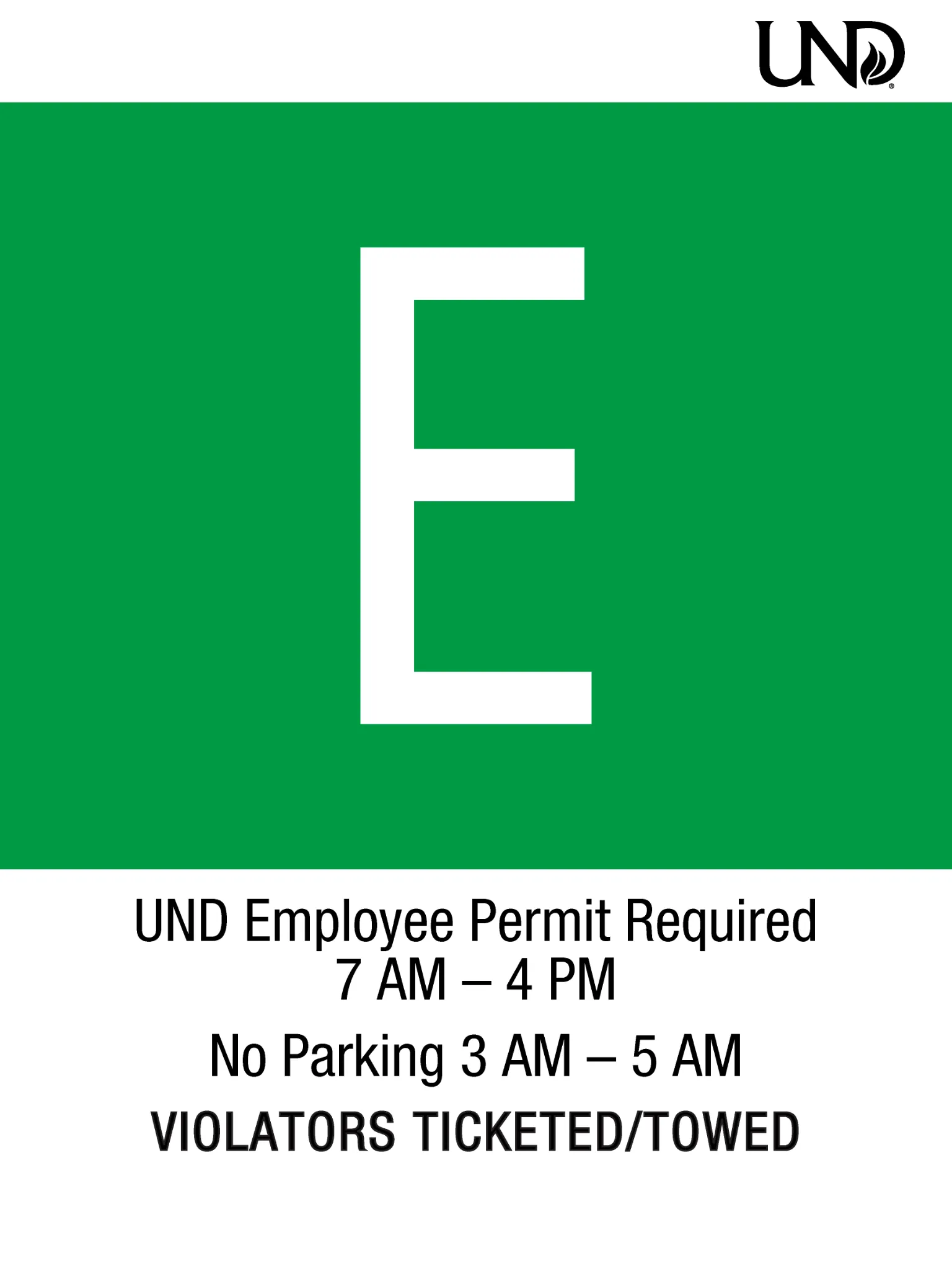 UND parking sign with a solid green background labeled E. Employee permit required 7 am to 4 pm. No parking 3 am to 5 am. Violators ticketed or towed