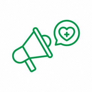 Green outline icon of a megaphone next to a speech bubble containing a heart with a medical cross, representing health promotion or wellness communication.